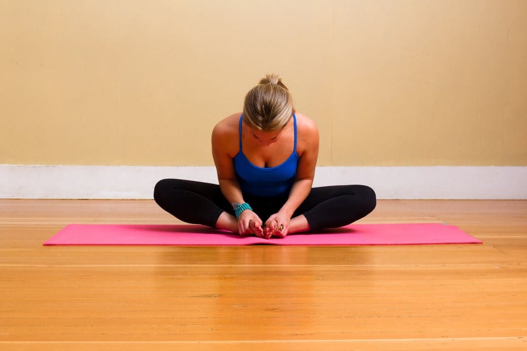 Yoga butterfly pose Cut Out Stock Images & Pictures - Alamy